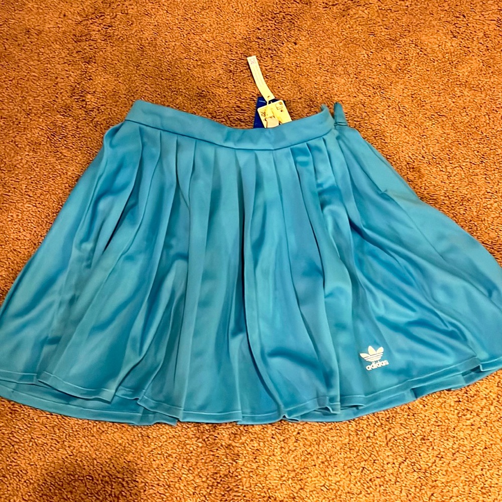 Brand new!! Adidas Sky Rush Blue Pleated tennis cheerleading skirt. Size small